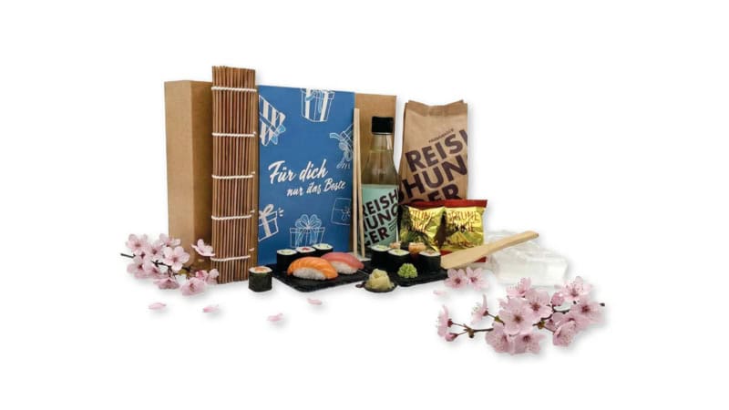 Geschenkbox der Erlebnisfabrik zu Sushi Erlebnissen mit blauer Banderole.